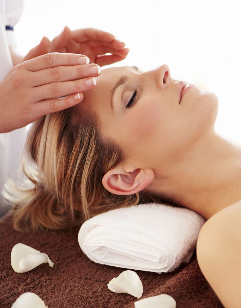 Performing Head Reiki On A Woman